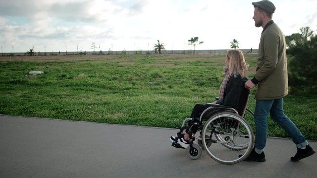 Outdoor walk with disabled girlfriend