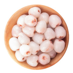 heap of peeled lychees isolated on white background in wooden plate
