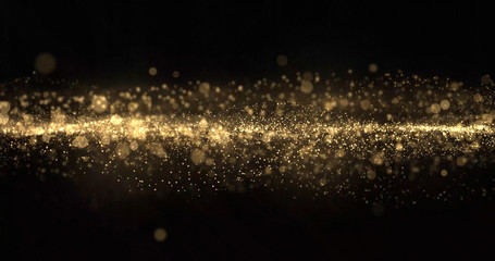 Gold glitter particles wave, light bokeh background, shining gold sparks. Gold glow and shimmering sparkles shine, abstract magic bright sparks in wave motion © Ron Dale