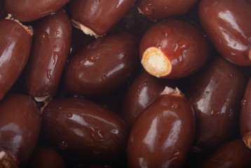 seeds of lychee with water drops background