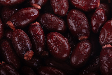 seeds of lychee with water drops background