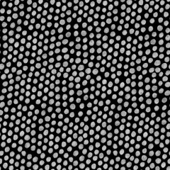 Abstract seamless pattern with white dots on black background 