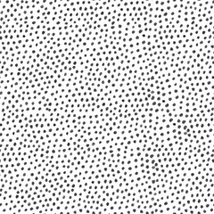 Abstract seamless pattern with black dots on white background 