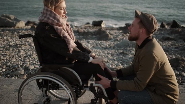 Man expressing love to his handicapped girlfriend