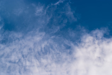 Blurred clouds, sky during in morning. Blue,white pastel heaven,soft focus lens flare sunlight.