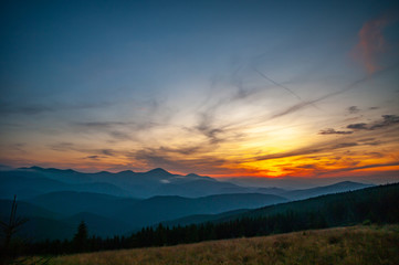 Sunset in the mountains in summer