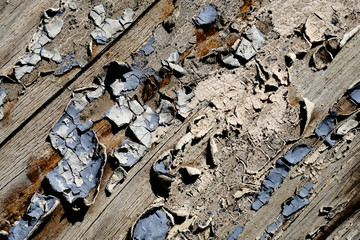 Old peeling paint on a wooden surface. retro wall background.