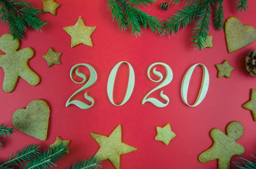 Christmas, New Year's red background. gingerbread. 2020 year