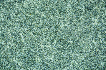  Natural granite under water. Waves create a unique pattern.