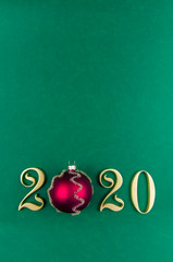 Naklejka na ściany i meble Christmas, New Year's green background. 2020 new year