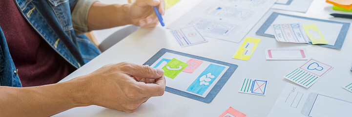 Creative Web Designer planning application and developing template layout, framework for mobile...