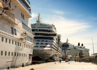 Luxury cruise ships are docked in cruise terminal located on the Tagus River of Lisbon, Portugal.