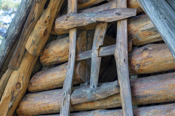 Window made of wood on an old house in the park