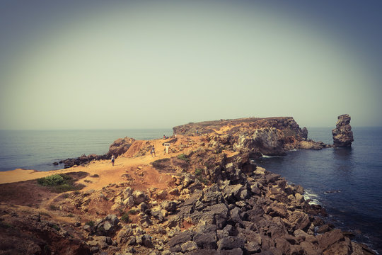 Beautiful summer coast with towers of stones. Travessa da Papoa, Peniche, Portugal