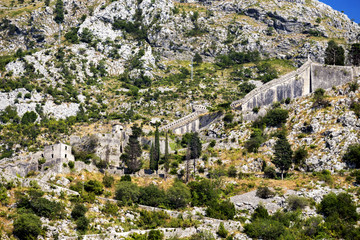 Fototapeta na wymiar Ancient St John Fortress in the mountains of Kotor city at Montenegro.