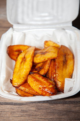 Fried Plantains In Carryout Container