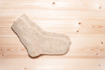 Wool socks on a wooden desk