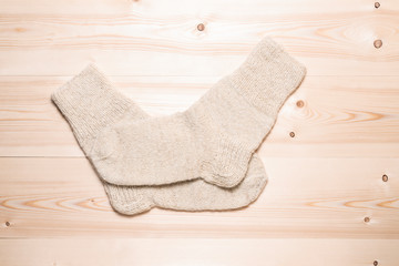 Wool socks on a wooden desk