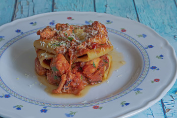 Paccheri pasta with octopus sauce and Italian Pecorino cheese