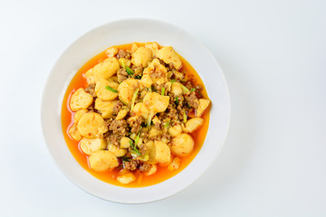 Mapo Tofu, popular Chinese dish.  The classic recipe consists of silken tofu, ground pork or beef and Sichuan peppercorn to name a few main ingredients.