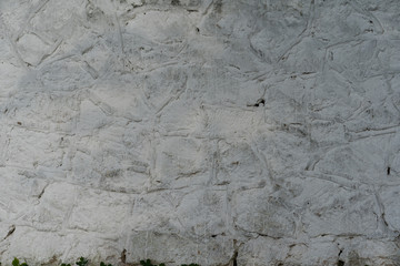 Wall of stone as texture and background