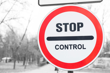 Stop control sign in front. Red stop road sign. Stop sign for traffic