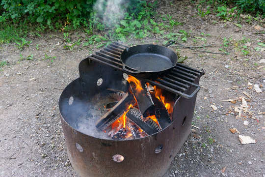 Cast Iron Skillet Warming Over Fire