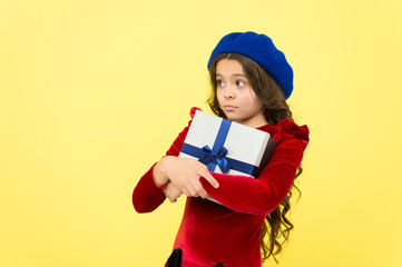 Shopping mall. boxing day. parisian girl in french beret go shopping. autumn fashion. school fall season. greedy small girl with present box. small girl hold holiday gift. happy birthday. copy space