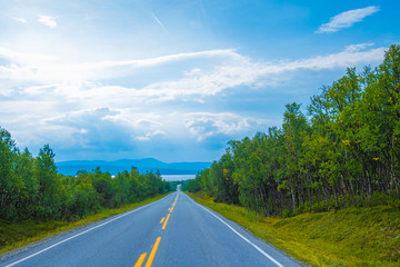 Fototapeta premium Road through Rockies. Great summer day.