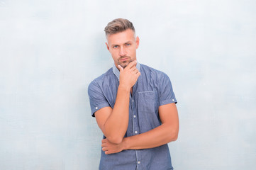 Touching chin. Man mature good looking model. What does it mean being macho. Barber hairdresser....