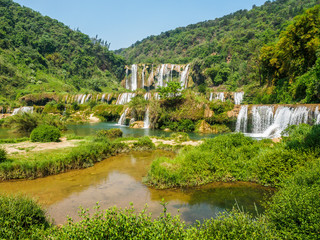 Fototapeta na wymiar Nine Dragon waterfalls near the City of Luoping (Yunnan Province - China).