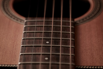 Acoustic guitar fretboard. Close up.