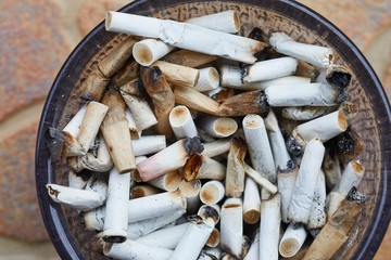 Ashtray full of cigarette butts