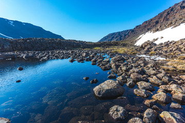 Fototapeta premium Small lake on Putorana Plateau. Russia, Krasnoyarsk region