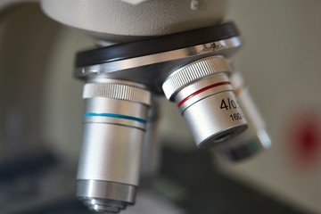 Fototapeta na wymiar Microscope lens closeup in a lab