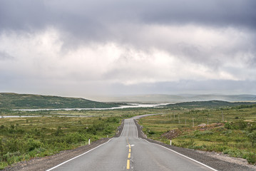 View of the road in severe nature of northern Russia