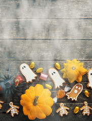 Halloween Jack o Lantern pumpkin candy bowl with candy and halloween cookies Trick or Treat 