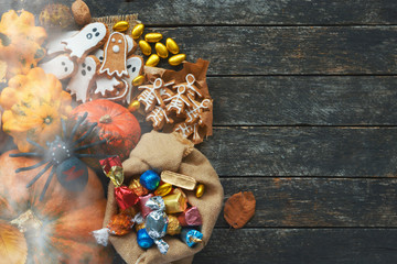 Halloween Jack o Lantern pumpkin candy bowl with candy and halloween cookies Trick or Treat 