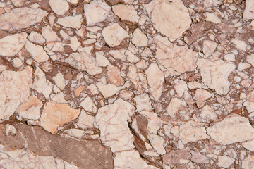 Cracked antique red marble texture and background.  Rough natural rock texture.