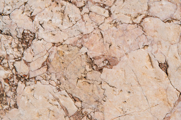 Cracked antique red marble texture and background.  Rough natural rock texture.