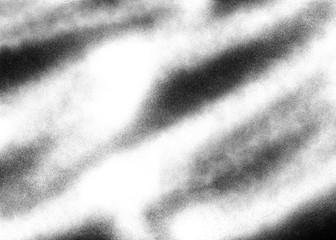 Subtle grain texture. Abstract black and white gritty grunge background. Dark paint spray particles on paper