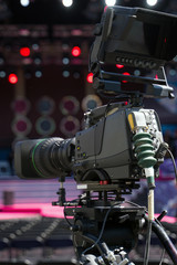 Professional video camera is ready to shoot the concert.
