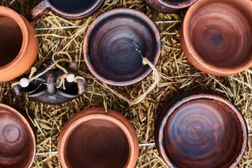 Handmade pottery. Clay dishes close up. Handicraft Exhibition