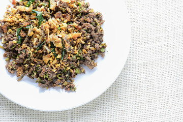 Minced fish Spicy Salad with Herbs, It is also eaten in the North and Northeast regions, an area of Thailand where the majority of the population is of the Lao ethnicity.