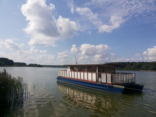 vintage tourist barge in lake