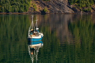 Small beautiful boat in a lake or in a large river