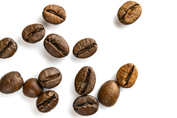 Roasted coffee beans isolated in white background cutout. Coffee background or texture concept.