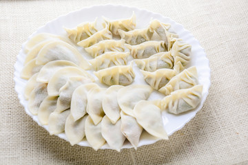 Japanese Fried Dumplings, the half moon-shaped dumplings served in Asian restaurants as an appetiser or side dish, pork and vegetable filling.