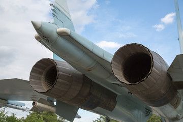Fighter jet nozzles on a Sunny day. Military equipment Technology.