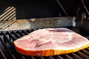 Ham steak on the grill. Calgary, Alberta, Canada